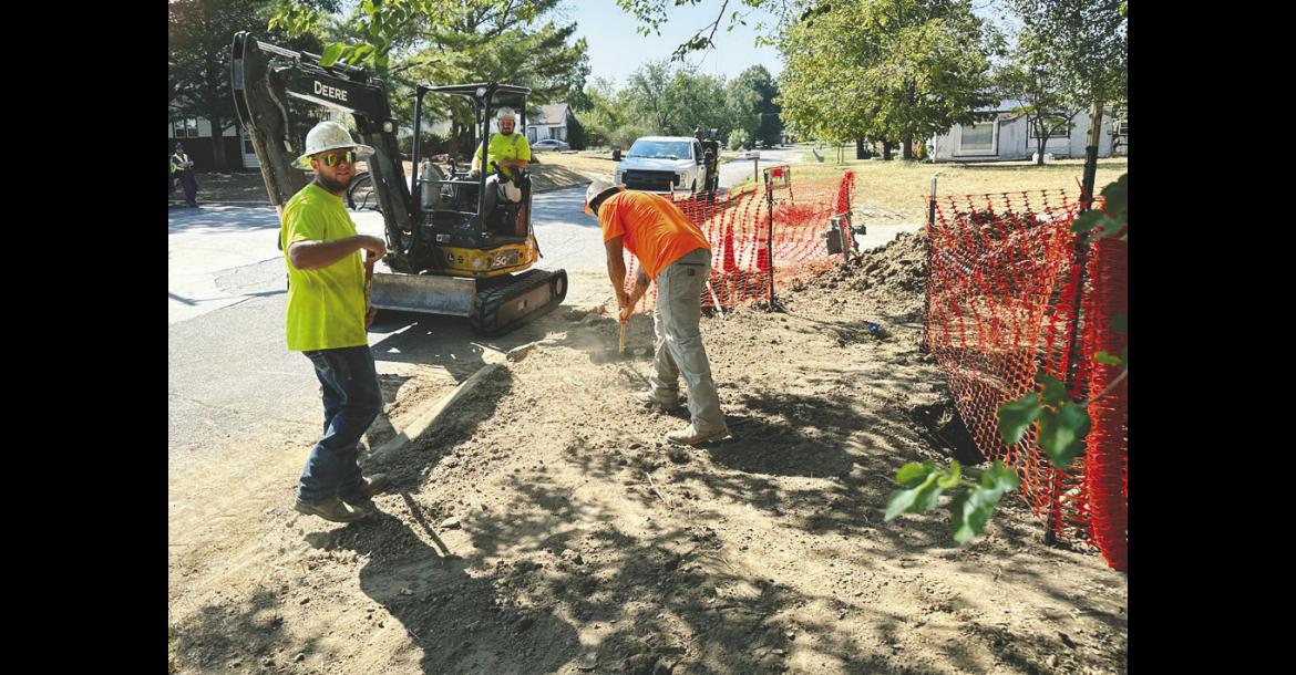 Crews were busy Friday morning on Harding Street just north of Hoover digging trenches for new natural gas lines that are being installed by Summit Utilities. The project is ongoing in the surrounding neighborhoods. —Staff Photo by Mike Gifford