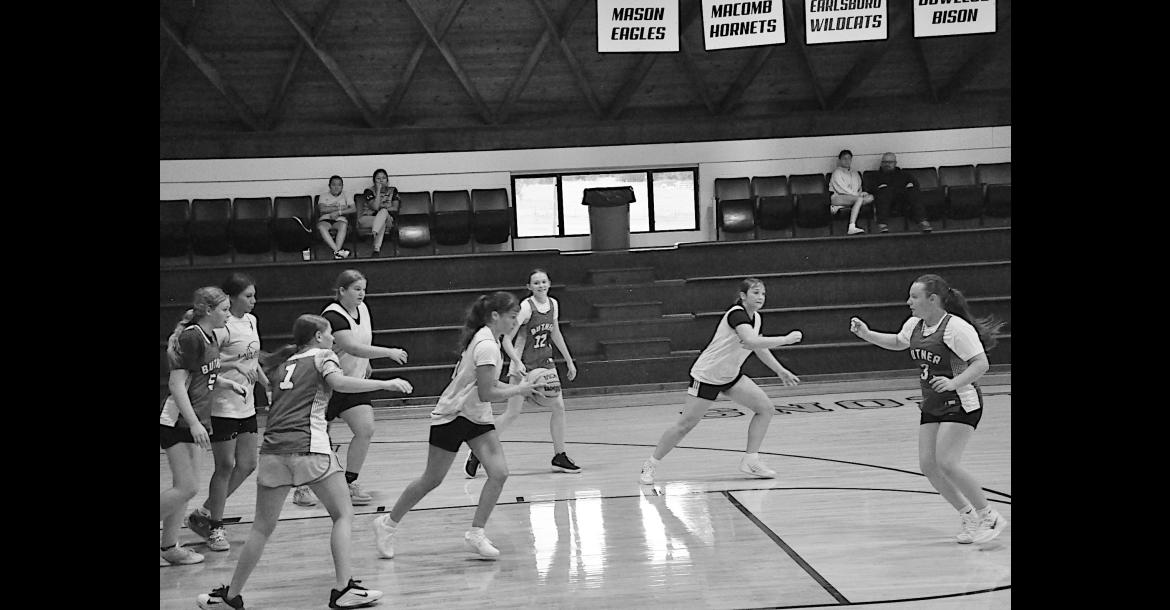 Butner Lady Eagles and Bowlegs Lady Bison participate at the basketball camp Monday. Staff Photo by Bill Anderson