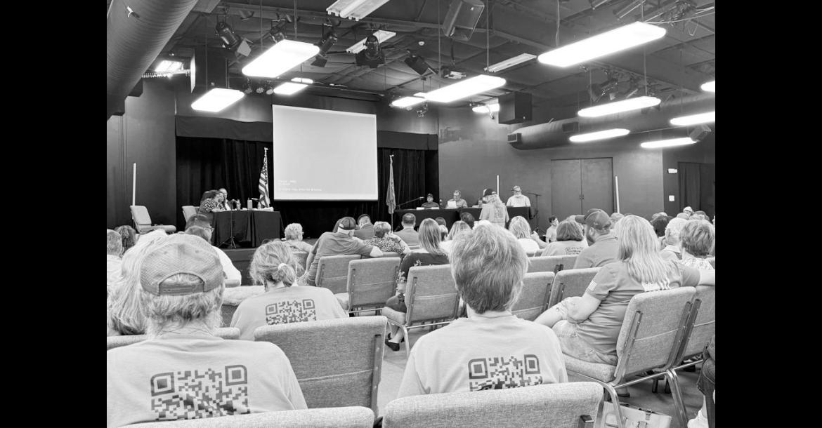 Hundreds of people gathered for a board of trustees meeting at Inola High School June 29, 2026. At Monday’s meeting, Inola’s mayor and the board officially hit pause on zoning approvals for a proposed $4 billion aluminum smelter, which has backing by President Trump. (Photo by Graycen Wheeler/KOSU)