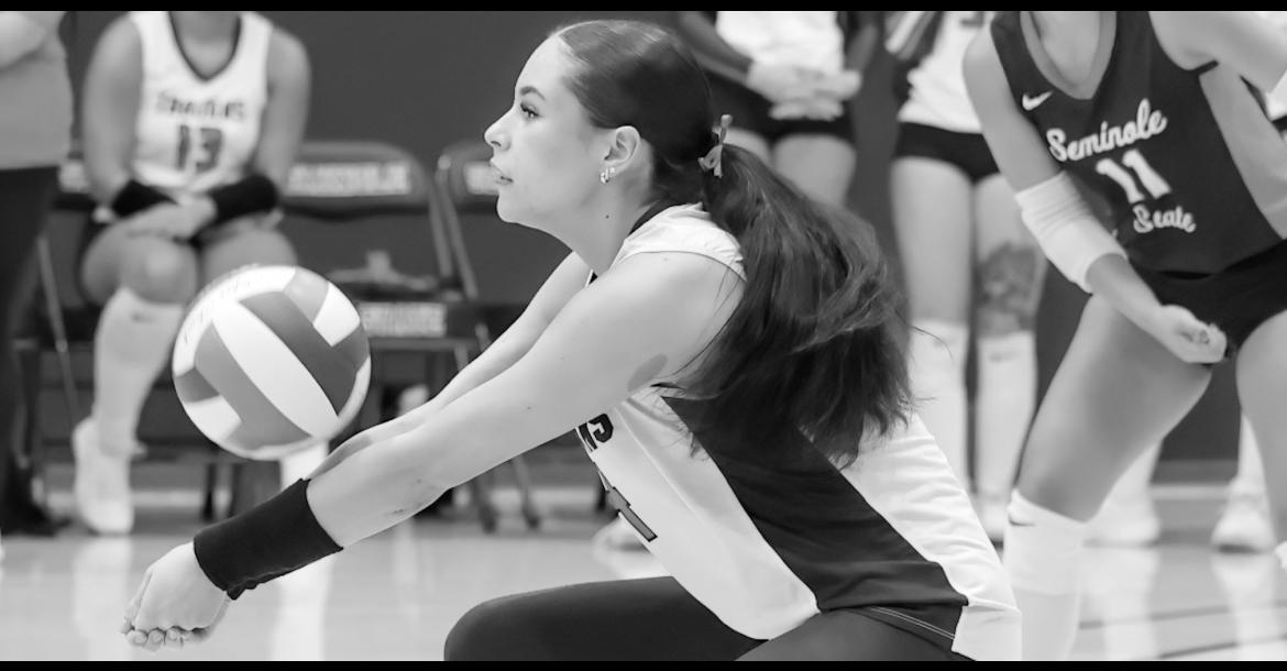 Seminole State Lady Trojan Ellyana Theriot returns a serve to her front line. Courtesy Photo by Glen Bryan