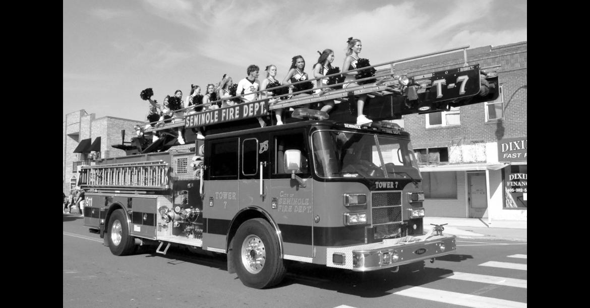 Right, the Seminole High School cheerleaders made a fiery entrance in last Friday’s 2026 homecoming parade on Main Street. The parade featured an array of class floats, the homecoming court, the SHS marching band and more. Homecoming weekend was full of activities, including the first ever alumni tailgate party, the Annual ESA Soup and Stew Dinner, the Alumni Hall of Fame induction ceremony and an all-class reunion at the Reynolds Wellness Center Saturday night. —Staff Photo by Bill Anderson