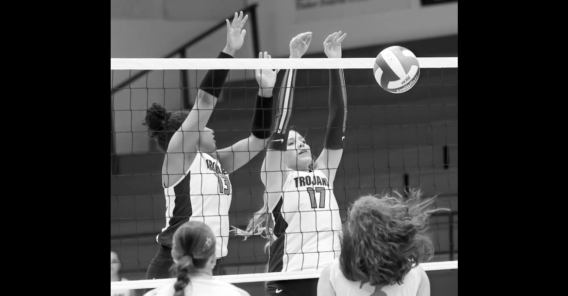 Seminole State teammates Yantzy Martinez and Kennadee Mason block at the net.