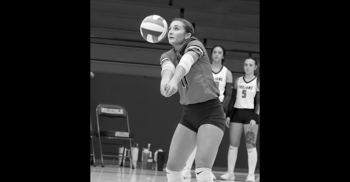 Seminole State Lady Trojan Lilia Benoit returns a serve to her front line. Courtesy Photo by Glen Bryan
