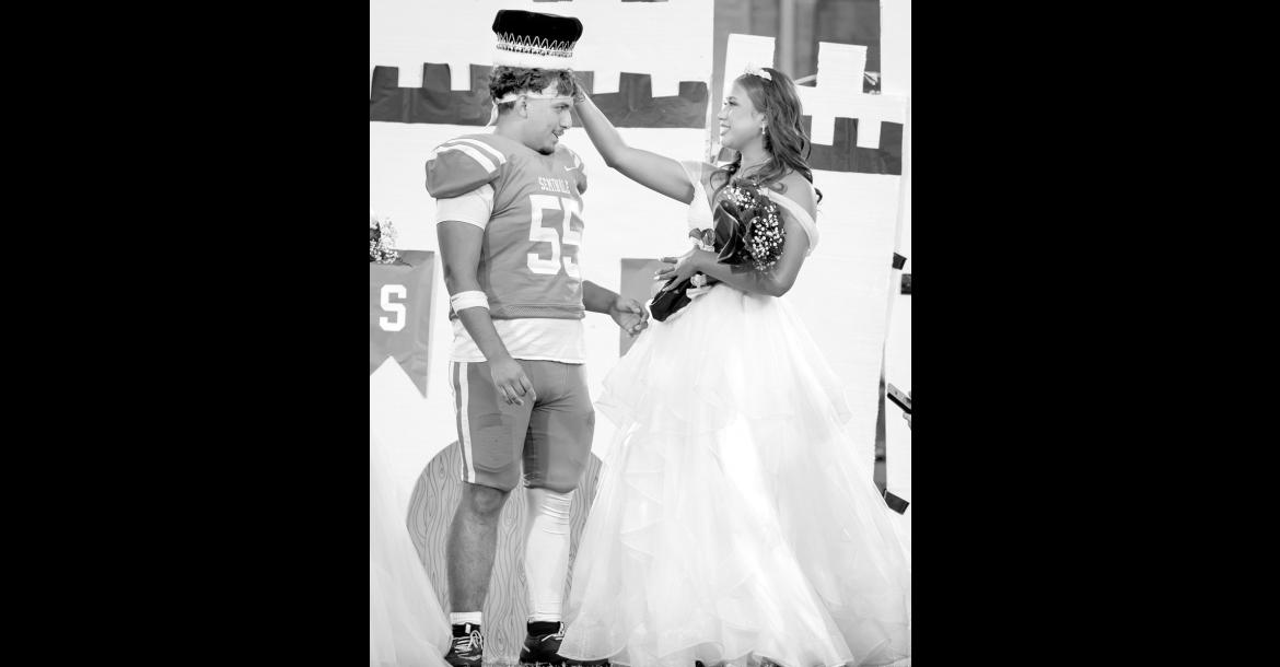 Seminole High School Homecoming Queen Tafv Stewart crowns Aiden Napier king during homecoming festivities ahead of the Chieftains matchup against Pauls Valley Friday night. The Chiefs prevailed 24-22. See page 5 for more details. —Photo by Ben Schatzel