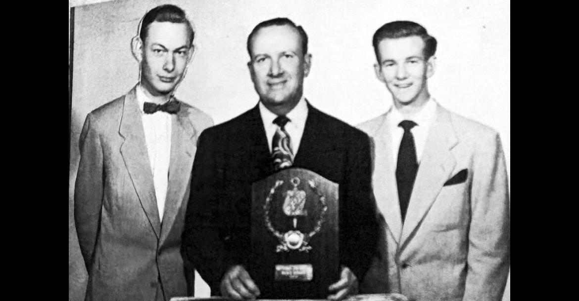 From left, Bill Wantland, Seminole High School Principal and Debate Coach Harland B. Mitchell and Tommy Kelton pose following the team’s 1952 national debate championship in Pueblo, Colorado. Mitchell holds a plaque from Phi Rho Pi, a national forensic fraternity, honoring the Seminole Junior College championship team. (Provided)