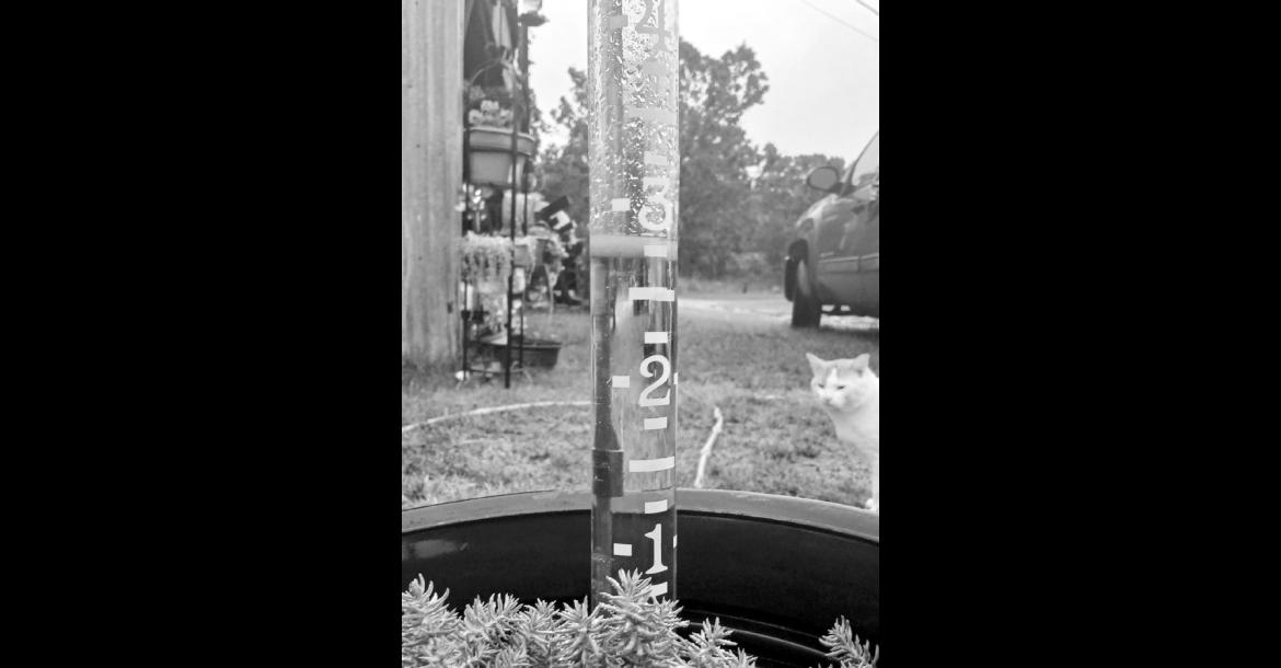 This rain gauge, located north of St. Crispin’s, had nearly three inches of rain in it by 8 a.m. Thursday. Seminole County has been in a drought, and Wednesday and Thursday marked the first significant rain event since July. —Staff photo by Bill Anderson