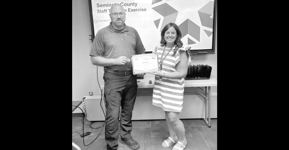 Blake Enos, Local Emergency Response Coordinator for the Seminole County Health Department, was presented the “Cheers For Peers” award. The presentation was made by Daryn Kirkpatrick, Regional Administrative Director. —Courtesy photo