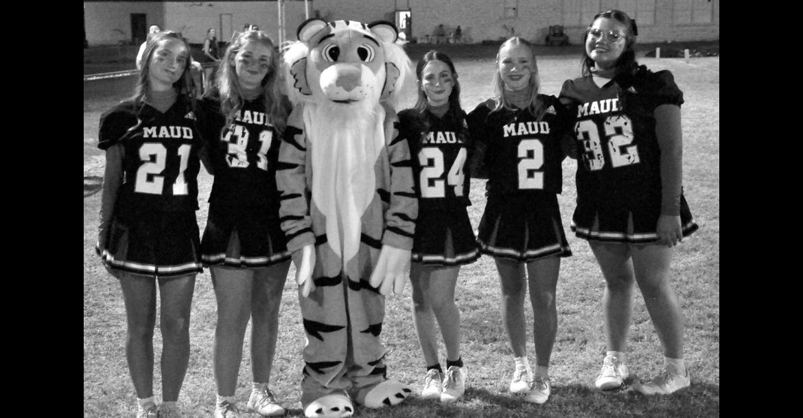 The Maud Tiger cheerleaders were on hand to help lead the Tigers to a 36-0 victory over Cave Springs Friday night. Pictured l-r are Nevaeh Bicek, Presley Porterfield, Lawson Peters (mascot), Chloe Peters, Payton Collins and Aloyna Siqueiros. The Tigers travel to Graham-Dustin this Friday night. —Staff Photo by Bill Anderson