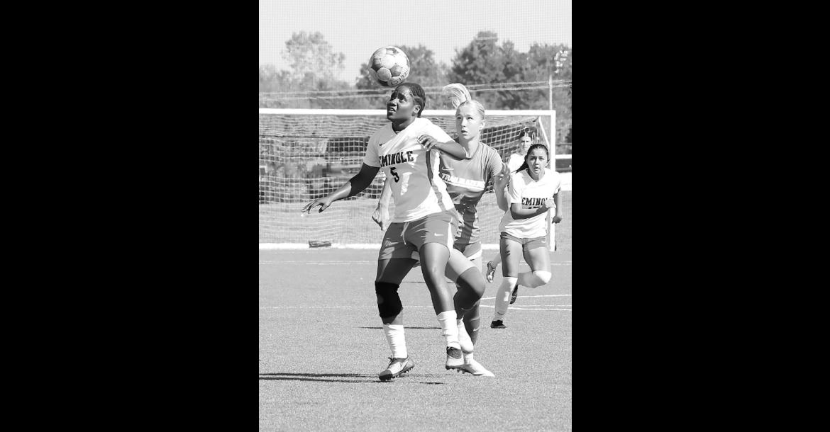 Seminole State Lady Trojan Fredricka Finnikin uses her head to control the ball. Courtey Photo by Glen Bryan