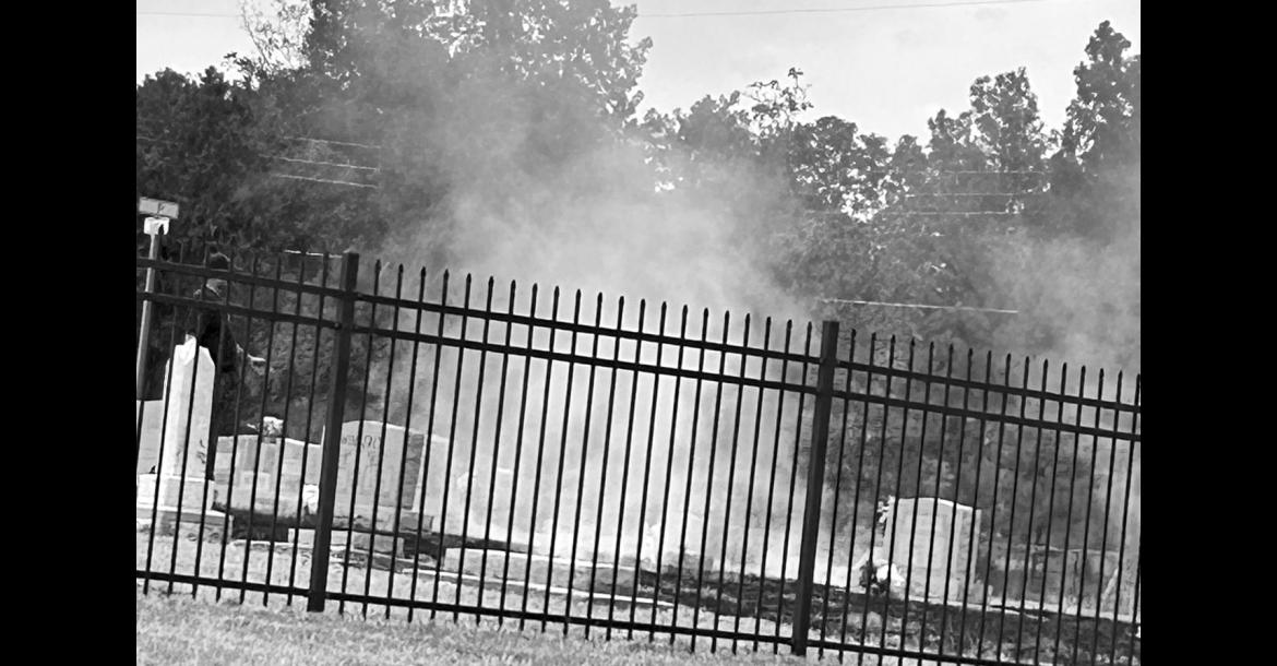 A lightning bolt struck the southern edge of Maple Grove Cemetery at around 1 p.m. Sunday, sparking a grassfire that was quickly extinguished by the Seminole Fire Department. Although lightning and thunder moved across the city, only a trace of rain fell. —Staff photo by Ken Childers