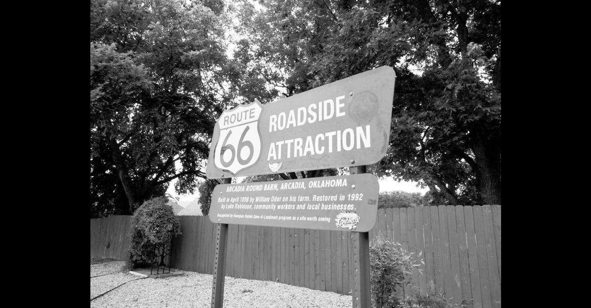A sign for the Arcadia Round Barn along Route 66 in Arcadia is pictured June 12, 2026. (Photo by Emma Murphy/Oklahoma Voice)