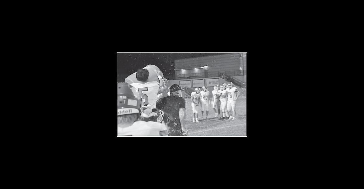 Seminole Chieftain Head Coach Mike Synder gets a Gatorade bath after the 46-12 win over the Knights and earning his 400™ win of his football coaching career. Staff Photo by Bill Anderson
