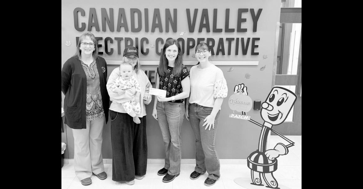 The CVEC Operation Round Up Program recently granted Impact Seminole with a $5,000 grant towards the soon-to-open Impact Center. Pictured l-r: ORUF representative Sheri Wyant, unknown with child, Impact Seminole Board Chair Dr. Jenna Geohagan and ORUF representative Daphne Wilson. (Photo provided)