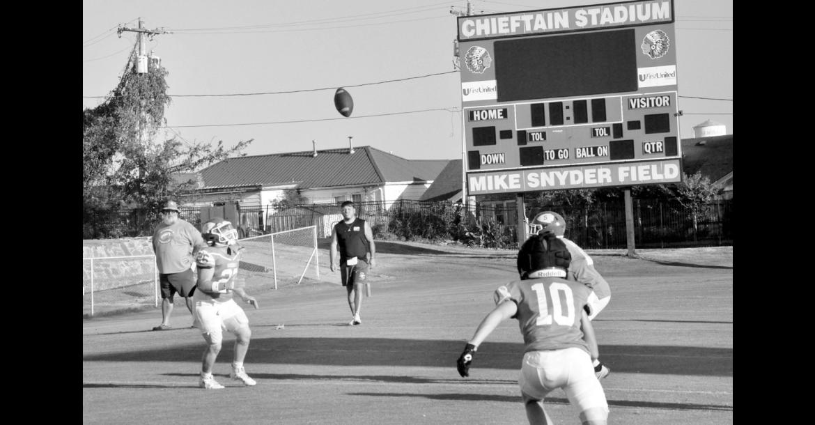 It’s hard to believe that football season is upon us, especially since we’ve been experiencing days where the temperature is above 100 degrees. Despite the heat, the Seminole Chieftains held their annual Green and White scrimmage game Friday night. The action continues with a scrimmage against Morris this Friday, Aug. 21 and the season officially opens Aug. 28 at N.W. Classen. Kickoff is slated for 7 p.m. —Staff Photo by Bill Anderson