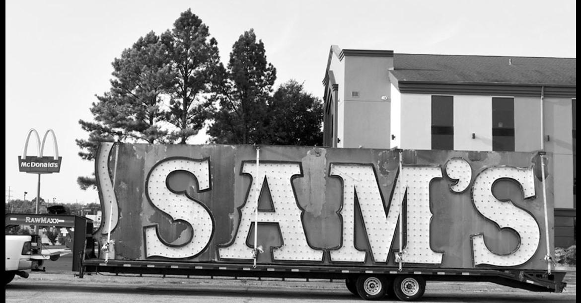 Drivers in Seminole may have noticed a large sign on a trailer with the words “Sam’s” on one side and “Town” on the other Thursday morning. The sign is from the recently closed Sam’s Town Casino in Tunica, Mississippi and is bound for the Neon Museum in Las Vegas. —Staff Photo by Andy Wilson