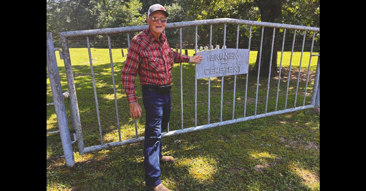 Eighty-nine-year-old Billy Joe “BJ” Isaacs, a graduate of Konawa High School, at the gate of Bruner Cemetery in Seminole County. Isaacs has been anonymously maintaining for the cemetery for more than two decades. —Photo by Bob Melton