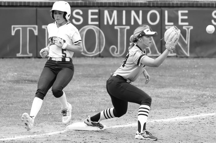 Seminole State Lady Trojan Camryn Westbrook beats the throw to first base. Courtesy Photo by Glen Bryan