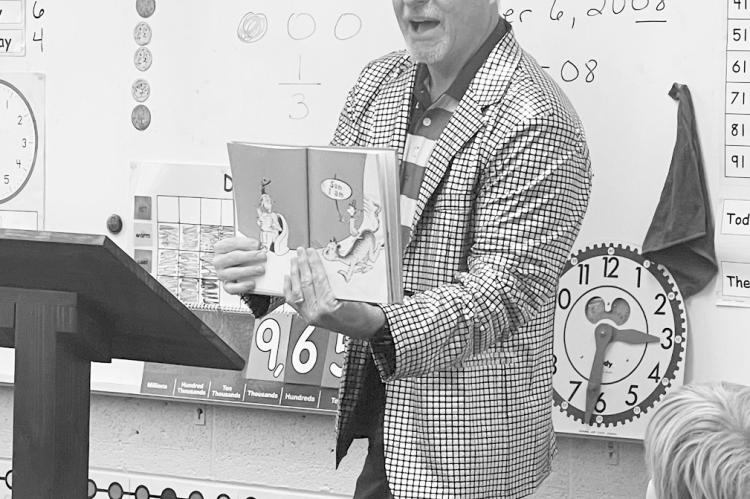 Seminole City Manager Steve Saxon reads the Dr. Seuss classic “Green Eggs and Ham” to Mrs. Marley’s class at Wilson Elementary last week as part of Read Across America Week. The students also made green eggs and ham crafts to take home. —Courtesy 