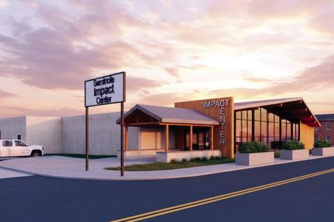 Above left, a large crowd was present at 737 Duck Calls in Seminole Wednesday, Nov. 12 as plans were unveiled for The Impact Center, a comprehensive resource center for local residents. The center will be housed in the former Al and James Supermarket buil