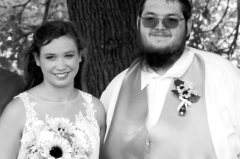 Local Couple Exchange Nuptials in Rustic Setting at Event Center in Prague