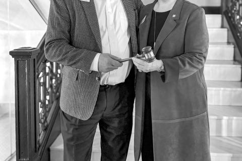 BancFirst President and CEO Darryl Schmidt (left) passes the gavel to Seminole State College President Lana Reynolds (right) as Reynolds assumes the role of 2026 Oklahoma Academy chair during the Academy’s annual business meeting Jan. 16 in Oklahoma Cit