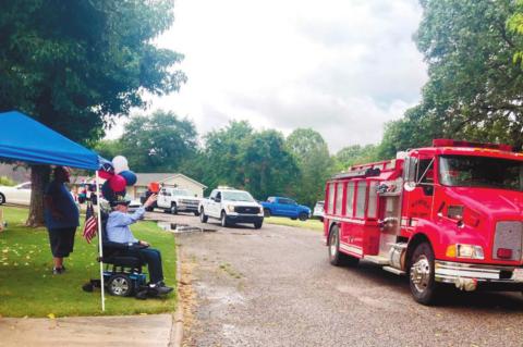 Surprise Parade Celebrates Century-old WWII Veteran