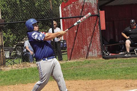 Bowlegs Bison Kolten Beaver knocks the ball out to the outfield Thursday against Maud. Bowlegs lost 2-14. Staff Photo by Bill Anderson