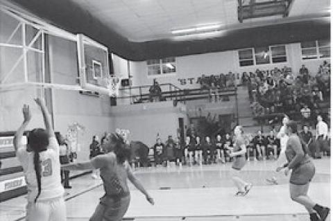 Wewoka Lady Tiger Heisel Sanchez shoots from three-point range Tuesday night. Staff Photo by Bill Anderson
