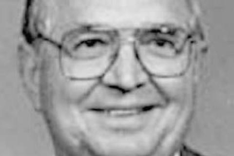 American Legion Honors Airman/Educator With Flag