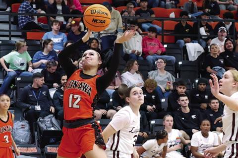 Konawa Lady Tiger Laila Wroolie puts up the basket attempt against Destiny Christian. Konawa lost 23-69. Courtesy Photo by Glen Bryan