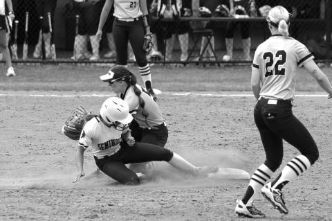 Seminole State Lady Trojan Madi Doty beats the tag of defender at second base. Courtesy Photo by Glen Bryan