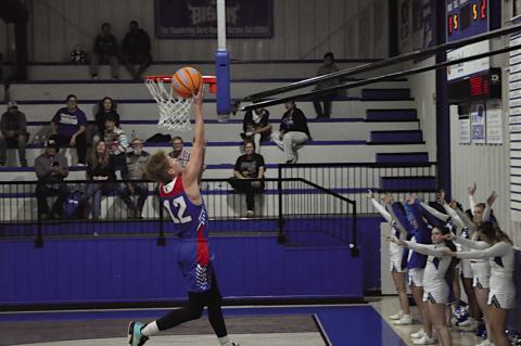 Butner Eagle Rhyne Bethany flies in for the easy layup Tuesday at Bowlegs. Staff Photo by Bill Anderson