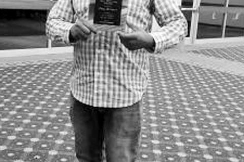 Tony Bruner was presented with the Neil Molleur Award at the recent Seminole Chamber of Commerce Banquet. Bruner is a board member of the Seminole Arts Council and was honored for his dedication to the community. (Courtesy photo)