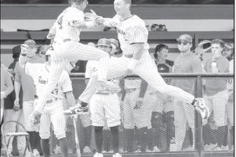 Courtesy Photo by Glen Bryan Seminole State’s Cohl McCoy and Brayden Harpole celebrate McCoy’s homerun.