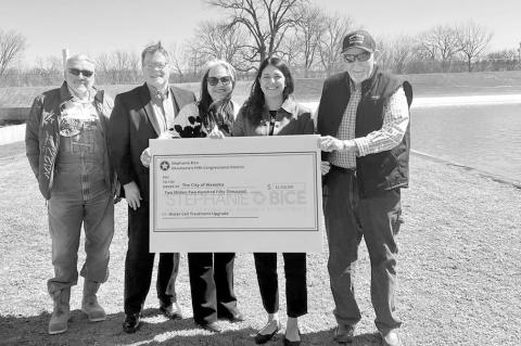 Pictured l-r: Councilman Barry Tucker, Councilman Richard Ellwanger, City Manager Becky Stone, Congresswoman Stephanie Bice, and Mayor of Wewoka Tom Ryan at the City of Wewoka Wastewater Treatment Plant holding the ceremonial check. (Courtesy photo)