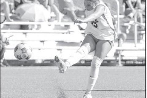 SSC Lady Trojan Molly-Kate Lundy takes a shot at the goal Sunday. Courtesy Photo by Glen Bryan