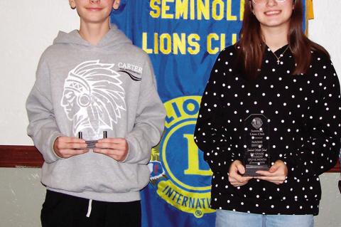 Pictured above left are Nickelas Parker and Anna McCreight, the Seminole Middle School Rotary Students of The Month for January. Above right, Brodie Kuehner and Naomi Bryan were honored by the Lions Club as the January Middle School Students of the Month.