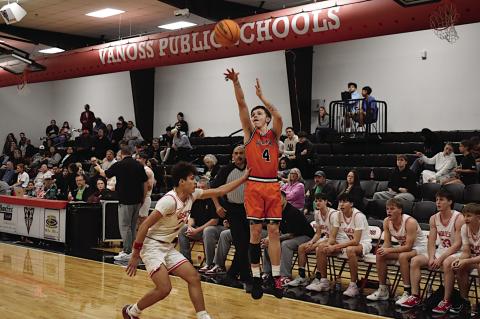 Konawa Tiger Damien McCullar shoots from three-point range Thursday night. Staff Photo by Andy Wilson