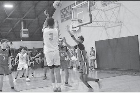 New Lima Falcon Blaze Carter finds an opening and takes the shot Tuesday night at home against the Chieftains. Staff Photo by Bill Anderson