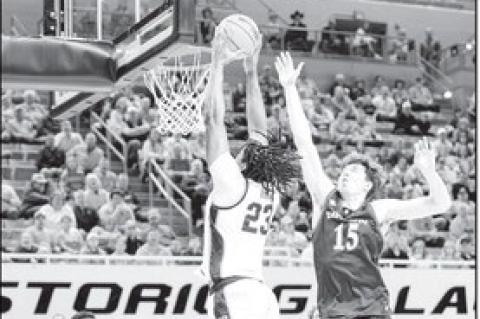 Oklahoma State’s Center Benjamin Ahmed goes up for the basket. Courtesy Photo by Ben Schatzel