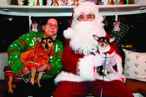 Carter Real Estate sponsored the “Santa Paws’ event, a costume contest for fourlegged friends at Snowman Wonderland last week. Watson (pictured at top) claimed second place and third place was captured by Mack and Dolly, pictured above. The Seminole H