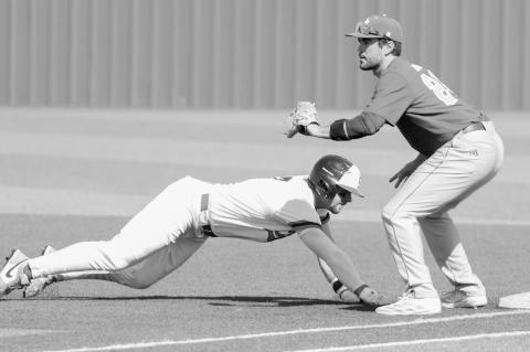 Seminole State’s WT Jones heads back to first base just ahead of the throw from the NEO pitcher. Courtesy Photo by Glen Bryan