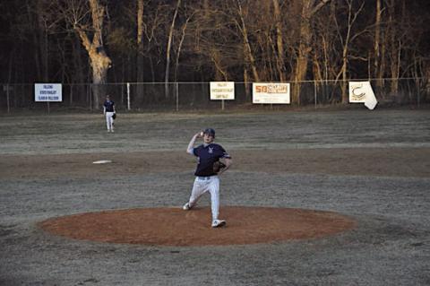 New Lima Falcon Logan Peffley fires one across home plate Tuesday afternoon. Staff Photo by Bill Anderson