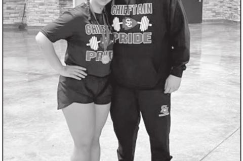 Seminole’s Kyleigh Hause poses with Coach Thomas Bare