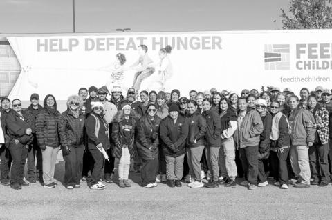 Volunteers and staff from the Chickasaw Nation and Feed the Children at the Holiday Resource Rally for Pontotoc County families Dec. 10. The Chickasaw Nation and Feed the Children partnered to bring holiday care packages to Pontotoc County families during