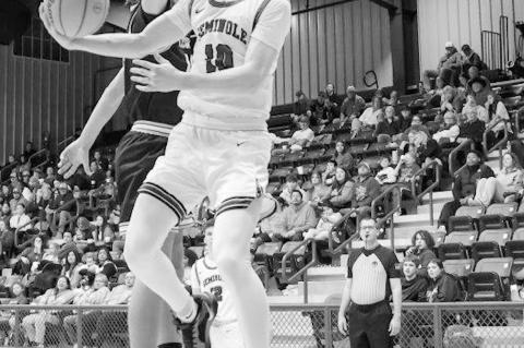 Seminole Chieftain Justice Kotchavar gets his shot off before the defender tries to block the shot. Courtesy Photo by Glen Bryan