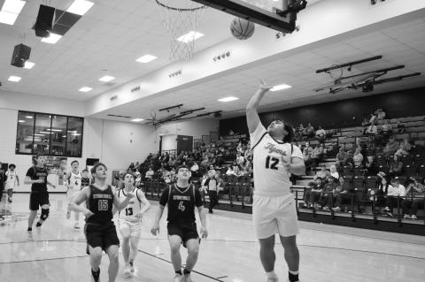 Konawa Tiger Quentin Shaw makes the layup Monday night. Staff Photo by Andy Wilson