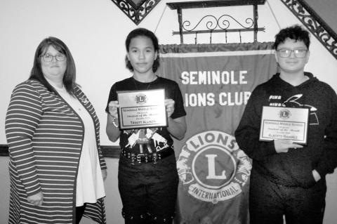 Trinity Allison (center) and Alberto Ramirez were selected by their teachers as the December Lions Students of the Month. Trinity is the daughter of Sammy and Candy Simpkins. She was on the Principal’s Honor Roll and plays trombone in Seminole High Scho