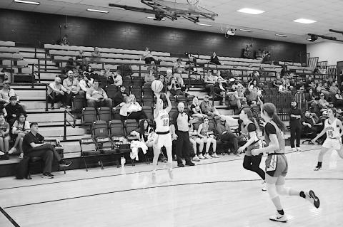 Konawa Lady Tiger Bridgett Arms shoots from three-point range. Staff Photo by Andy Wilson