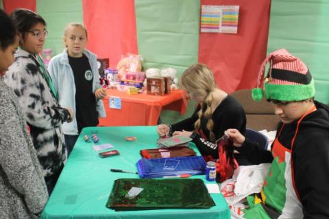 STUDENTS SHOP AT VARNUM'S STUCO HOLIDAY SHOP